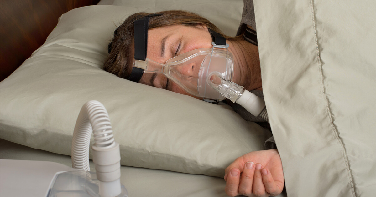 patient in sleep medicine study with breathing device