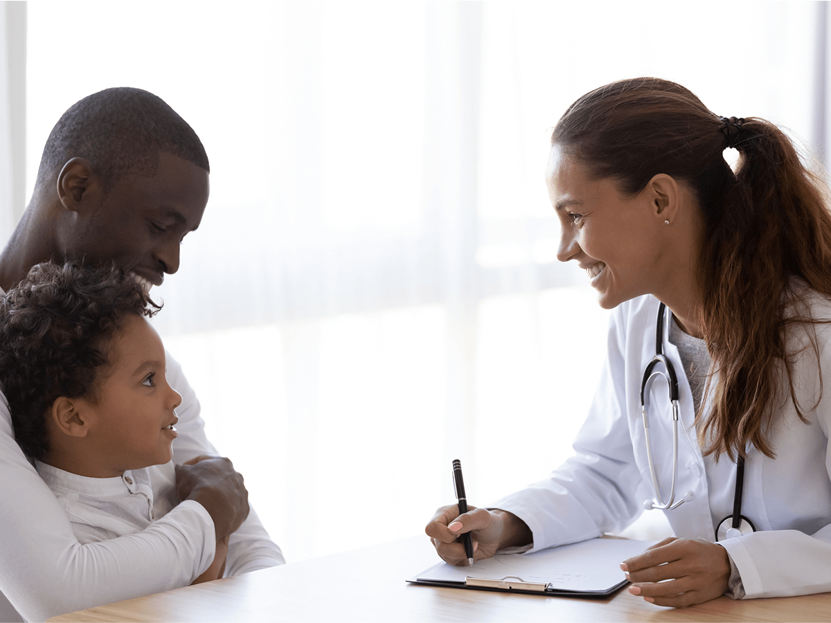 pediatrician with patient