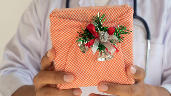doctor holding a gift