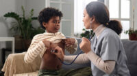 pediatrician with child
