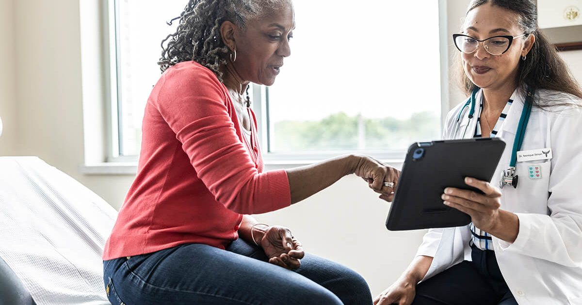 physician speaking with patient